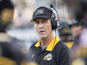 Hamilton Tiger-Cats head coach Kent Austin watches a play develop against the Winnipeg Blue Bombers on Aug. 12.