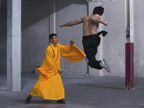 This image released by BH Tilt and WWE Studios shows Yu Xia and Philip Ng in "Birth of the Dragon."