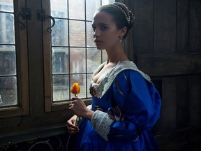 We may not have a movie, but we do have a movie still, of Alicia Vikander and...a tulip.