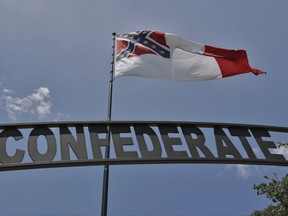 The Third Official Flag of the Confederacy flies over Confederate Memorial Park Thursday, Aug. 17, 2017, in Tampa, Fla. (AP Photo/Chris O'Meara)