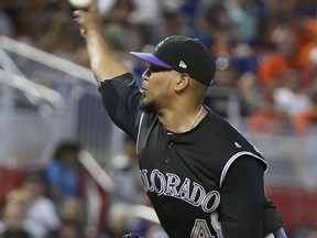 Colorado Rockies' German Marquez delivers a pitch during the first inning of a baseball game against the Miami Marlins, Sunday, Aug. 13, 2017, in Miami. (AP Photo/Wilfredo Lee)