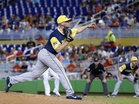 San Diego Padres' Clayton Richard delivers a pitch during the first inning of a baseball game against the Miami Marlins, Sunday, Aug. 27, 2017, in Miami. (AP Photo/Wilfredo Lee)