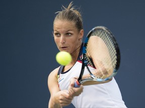Karolina Pliskova of the Czech Republic hits a backhand on her way to defeating Anastasia Pavlyuchenkova of Russia in Rogers Cup tennis action in Toronto on Wednesday, August 9, 2017 THE CANADIAN PRESS/Frank Gunn