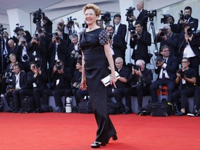 President of the jury of the 74th edition of the Venice Film Festival actress Annette Bening walks the red carpet, at Venice Lido, Italy, Wednesday, Aug. 30, 2017(AP Photo/Domenico Stinellis)