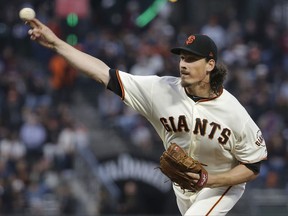 San Francisco Giants pitcher Jeff Samardzija throws to a Philadelphia Phillies batter during the third inning of a baseball game in San Francisco, Thursday, Aug. 17, 2017. (AP Photo/Jeff Chiu)