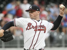 Atlanta Braves' Sean Newcomb pitches against the Philadelphia Phillies during the first inning of a baseball game, Wednesday, Aug. 9, 2017, in Atlanta. (AP Photo/John Amis)