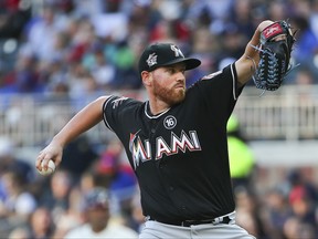 Miami Marlins starting pitcher Dan Straily works in the first inning of a baseball game against the Atlanta Braves, Saturday, Aug. 5, 2017, in Atlanta. (AP Photo/John Bazemore)