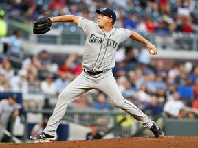 Seattle Mariners starting pitcher Andrew Albers (63) delivers in the first inning of a baseball game against the Atlanta Braves, Monday, Aug. 21, 2017, in Atlanta. (AP Photo/Todd Kirkland)