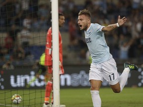 Lazio's Ciro Immobile celebrates after scoring during the Italian Super Cup final match between Lazio and Juventus at Rome's Olympic stadium, Sunday, Aug. 13, 2017. (AP Photo/Gregorio Borgia)