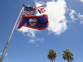 The flag of the USA and Guam on April 7, 2017 in Guam, Guam