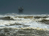 Large waves come ashore at Crystal Beach as Hurricane Harvey approaches Texas on Friday, Aug. 25, 2017.