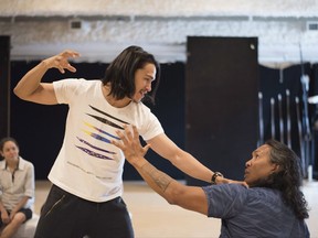 Actors Ujarneq Fleischer, left, and Johnny Issaluk rehearse a scene for the The Breathing Hole in Stratford, Ont. on Thursday, June 15, 2017. THE CANADIAN PRESS/Hannah Yoon