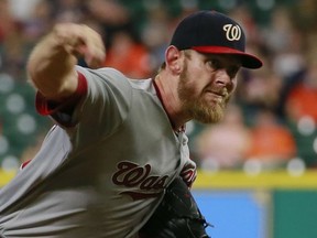 Washington Nationals' Stephen Strasburg delivers a pitch against the Houston Astros during the first inning of a baseball game Thursday, Aug. 24, 2017, in Houston. (AP Photo/Richard Carson)
