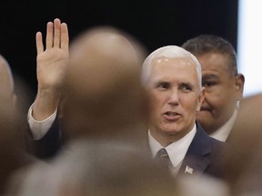 Vice President Mike Pence waves as he arrives for the Indianapolis Ten Point Coalition luncheon, Friday, Aug. 11, 2017, in Indianapolis. Pence is the keynote speaker at the luncheon. (AP Photo/Darron Cummings)