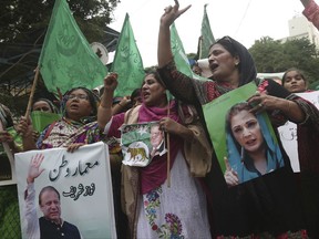 Supporters of Pakistani deposed Prime Minister Nawaz Sharif rally in favor of their leader in Karachi, Pakistan, Thursday, Aug. 3, 2017. The Supreme Court disqualified thrice-elected Sharif for concealing assets. (AP Photo/Shakil Adil)