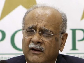 Pakistan Cricket Board chairman Najam Sethi addresses a news conference in Lahore, Pakistan, Monday, Aug. 21, 2017. Sethi says international cricket will return to the country next month when a World XI plays a three-match Twenty20 series in Lahore. (AP Photo/K.M. Chaudary)