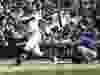 Javier Baez of the Chicago Cubs belts a two-run homer against the Toronto Blue Jays in interleague action Friday at Wrigley Field in Chicago. The Cubs were 7-4 winners.