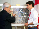 Prime Minister Justin Trudeau is briefed on the refugee installations at the Lacolle border crossing, Aug. 23, 2017 in Montreal.