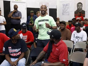 In this Tuesday, Aug. 1, 2017, photo, Nissan employee Casteal Foster speaks during a comment period at a workers' rally at the UAW Canton, Miss., headquarters, near the Nissan vehicle assembly plant. In voting that begins early Thursday, Aug. 3, some 3,700 direct employees at Nissan Motor Co.'s car and truck assembly plant in Canton will decide whether they want a union. The polls close at 7 p.m., local time on Friday. (AP Photo/Rogelio V. Solis)