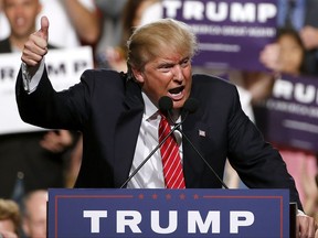 FILE - In this July 11, 2015 file photo, then-Republican presidential candidate Donald Trump finishes up speaking before a crowd of 3,500 in Phoenix. Trump was just a few weeks into his candidacy in 2015 when came to Phoenix for a speech that ended up being a bigger moment in his campaign than most people realized at the time. And now Trump is coming back to Arizona at another crucial moment in his presidency. (AP Photo/Ross D. Franklin, File)