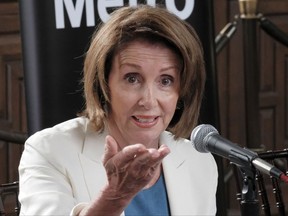 House Minority Leader Nancy Pelosi of Calif, takes questions during an infrastructure roundtable meeting at Union Station in Los Angeles on Wednesday, Aug. 16, 2017. Pelosi is criticizing Republicans who haven't spoken out against President Donald Trump's comments on white supremacists.  (AP Photo/Richard Vogel)