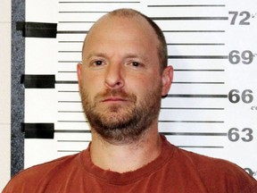 This undated photo provided by the Teton County Sheriff's Office shows Ryen Russillo, the host of "The Ryen Russillo Show" on ESPN Radio. Russillo was arrested and jailed after entering a condo in Jackson, Wyo., and refusing to leave early Wednesday, Aug. 23, 2017. Police say the man found in the bedroom had slurred speech and was incoherent. The 42-year-old Russillo faces misdemeanor criminal trespassing charges.(Teton County Sheriff's Office via AP)