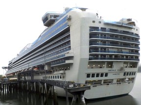 FILE - This July 26, 2017 file photo shows the Emerald Princess cruise ship docked in Juneau, Alaska. Kenneth Manzanares, charged with first-degree murder in the death of his wife Kristy while aboard the ship on a cruise to Alaska, pleaded not guilty in federal court in Juneau Wednesday, Aug. 23, 2017. Kristy Manzanares was found dead in a cabin last month on the ship while it was in U.S. waters off Alaska. (AP Photo/Becky Bohrer, File)