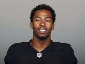 In a 2016 file photo, Oakland Raiders cornerback Sean Smith poses for a photo. The Los Angeles County District Attorney's Office says Smith was charged with assault and battery in connection with a July 4, 2017, incident. They say Smith beat the victim and then stomped on the man's head in Pasadena, Calif. (AP Photo)