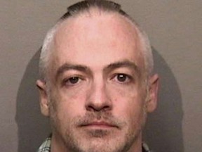 This undated photo released by the Alameda County, Calif., Sheriff's Office shows Wyndham Lathem, an associate professor of microbiology at Northwestern University. Lathem and Andrew Warren, an employee of the University of Oxford in Britain, were jailed in the San Francisco area in connection with the death of a young hairdresser in Chicago, police said. Lathem faces a Monday, Aug. 7, 2017 court appearance in the city of Pleasanton, Calif. (Alameda County Sheriff's Office via AP)