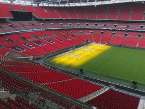 This photo taken on Wednesday, Aug. 9, 2017 shows a general view of Wembley Stadium in London. English soccer's national stadium will stage Premier League matches for the first time, giving the competition its biggest-ever crowds. Tottenham will be moving into the 90-000-capacity Wembley for the season while a new stadium is built at its White Hart Lane home 12 miles (19 kilometers) across north London. (AP Photo/Rob Harris)