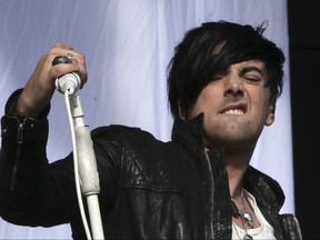This is a Saturday, Aug 20, 2011 file photo of British musician Ian Watkins, lead singer of Lostprophets, as he performs on stage at V Music Festival in Hylands Park, Chelmsford, England.