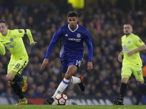 FILE - In this Sunday, Jan. 8, 2017 file photo, Chelsea's Ruben Loftus-Cheek, center, takes the ball forward during the English FA Cup third round soccer match between Chelsea and Peterborough United at Stamford Bridge stadium in London. Sent out on loan by Chelsea, the 22-year-old Loftus-Cheek looks sure to get plenty more first-team action at Palace either in central midfield or in the No. 10 role behind the striker. Loftus-Cheek, who has been an integral member member of England's under-21 side, has made 32 appearances for Chelsea since first breaking into the team in 2014. (AP Photo/Alastair Grant, file)