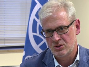 Laurent de Boeck the International Organisation for Migration (IOM) Chief of Mission for Yemen, talks to The Associated Press in Brussels, after a boat load of migrants were forced to abandon their boat by migrant smugglers, leaving five migrants dead and more than 50 still missing in the sea off the coast of Yemen, Thursday Aug. 10, 2017.  This is the second such drowning in two days, de Boeck said Thursday "We have five bodies for sure ... but we believe that there are certainly more than 50 who are still in the sea." (AP Photo)