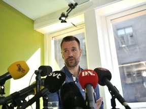 Sweden's Johan Gustafsson speaks during a press conference at Swedish library Association in Stockholm, Thursday, Aug. 10, 2017. A Swedish man kidnapped by Islamic militants in northern Mali nearly six years ago and released in June, says he brushed off the idea to flee because he realized he was held captive far away from everything. (Vilhem Stockstad / TT via AP)