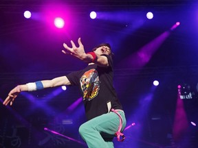 Winner American Matt "Airistotle" Burns, performs during the final of the Air Guitar World Championships in Oulu, Finland, Friday, Aug. 25, 2017. The American successfully defended his title at the 22nd Air Guitar World Championships in Oulu, Finland on Friday after competing in the finals against 15 contestants from South Korea, Pakistan, Sweden, Britain, Canada and other countries. (Eeva Rihel/Lehtikuva via AP)