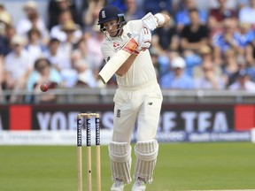 England's captain  Joe Root, plays a shot against the West Indies  during day four of the the second  cricket Test match at Headingley cricket ground in  Leeds, England Monday Aug. 28, 2017. (Nigel French/PA via AP)