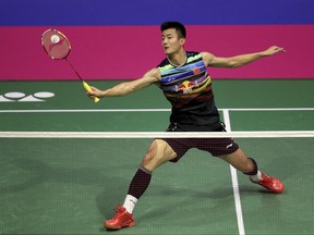 China's Long Chen makes a return to Denmark's Viktor Axelsen, during the semi finals on day six of the 2017 BWF World Badminton Championships at the Emirates Arena, Glasgow, Scotland, Saturday Aug. 26, 2017. (Jane Barlow/PA via AP)