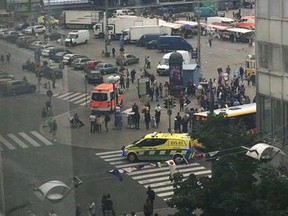 People was emergency services working in Turku Market Square in Turku Finland on Friday, Aug. 18, 2017. Police in Finland say they have shot a man in the leg after he was suspected of stabbing several people in the western city of Turku. (Facebook via AP)