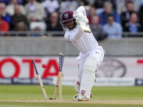 West Indies Shai Hope is bowled by England's Toby Roland-Jones during day three of of the day/night Test match between England and the West Indies, in Birmingham, England, Saturday Aug. 19, 2017. (David Davies/PA via AP)