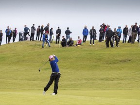 Korea's In-Kyung Kim plays her approach to the 2nd hole during day four of the 2017 Women's British Open at Kingsbarns Golf Links, St Andrews, Sunday Aug. 6, 2017. (Kenny Smith/PA via AP)