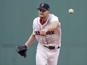 Boston Red Sox starting pitcher Chris Sale delivers during the first inning of a baseball game against the Cleveland Indians at Fenway Park, Tuesday, Aug. 1, 2017, in Boston. (AP Photo/Charles Krupa)