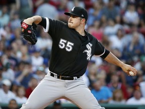 Chicago White Sox's Carlos Rodon pitches during the first inning of a baseball game against the Boston Red Sox in Boston, Friday, Aug. 4, 2017. (AP Photo/Michael Dwyer)