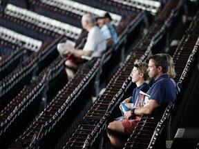 Fans wait for a baseball game between the Boston Red Sox and the Baltimore Orioles in Boston, Friday, Aug. 25, 2017. (AP Photo/Michael Dwyer)