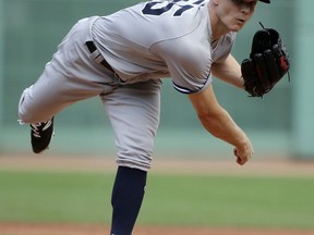 New York Yankees' Sonny Gray delivers a pitch against the Boston Red Sox in the first inning of a baseball game, Sunday, Aug. 20, 2017, in Boston. (AP Photo/Steven Senne)