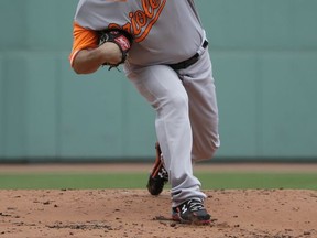 Baltimore Orioles' Wade Miley delivers a pitch against the Boston Red Sox in the first inning of a baseball game, Sunday, Aug. 27, 2017, in Boston. (AP Photo/Steven Senne)