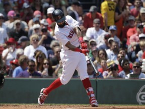 Boston Red Sox's Chris Young hits a home run off a pitch by Chicago White Sox's Mike Pelfrey in the first inning of a baseball game Sunday, Aug. 6, 2017, in Boston. (AP Photo/Steven Senne)