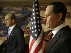 Wax figures of George Herbert Walker Bush, right, and George W. Bush at the Dreamland Wax Museum on Monday, Aug. 28, 2017, in Boston. Officials at Boston's new Dreamland Wax Museum say they're embracing the extra attention brought by online hecklers who have lampooned some of the attraction's likenesses. Critics say some of the statues missed the mark. Museum vice president Michael Pelletz says some are imperfect because they're based on photos and not actual measurements. (AP Photo/Stephan Savoia)