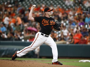 Baltimore Orioles starting pitcher Jeremy Hellickson throws to the Los Angeles Angels during the first inning of a baseball game in Baltimore, Friday, Aug. 18, 2017. (AP Photo/Patrick Semansky)