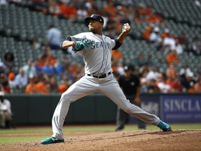 Seattle Mariners starting pitcher Ariel Miranda throws to the Baltimore Orioles in the second inning of a baseball game in Baltimore, Wednesday, Aug. 30, 2017. (AP Photo/Patrick Semansky)