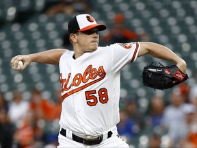 Baltimore Orioles starting pitcher Jeremy Hellickson throws to the Toronto Blue Jays in the first inning of a baseball game in Baltimore, Thursday, Aug. 31, 2017. (AP Photo/Patrick Semansky)